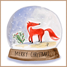Renard joyeux dans une boule de neige